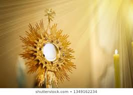Ray of sunlight shines upon the Blessed Sacramen