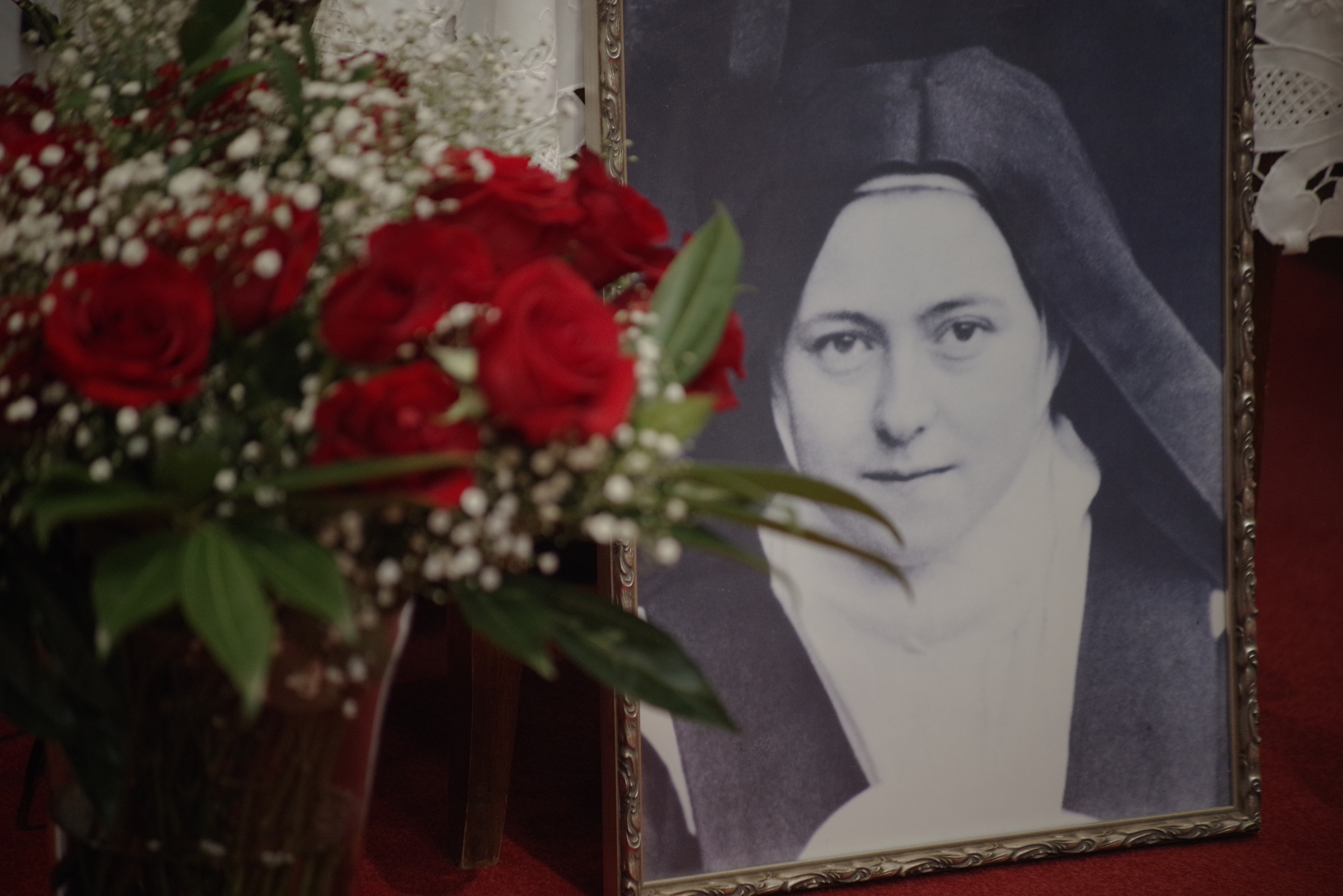 Photo frame of St Theresa with Roses