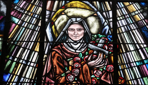 Stained Glass of St Theresa in Church