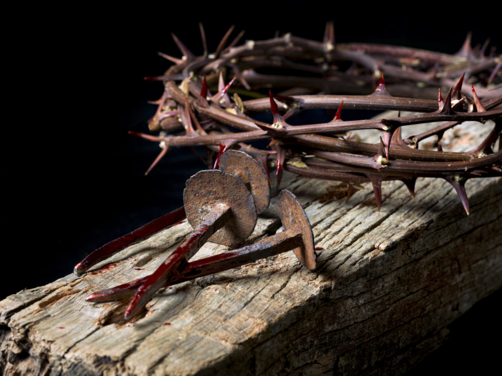 The nails and thorns crown on the cross